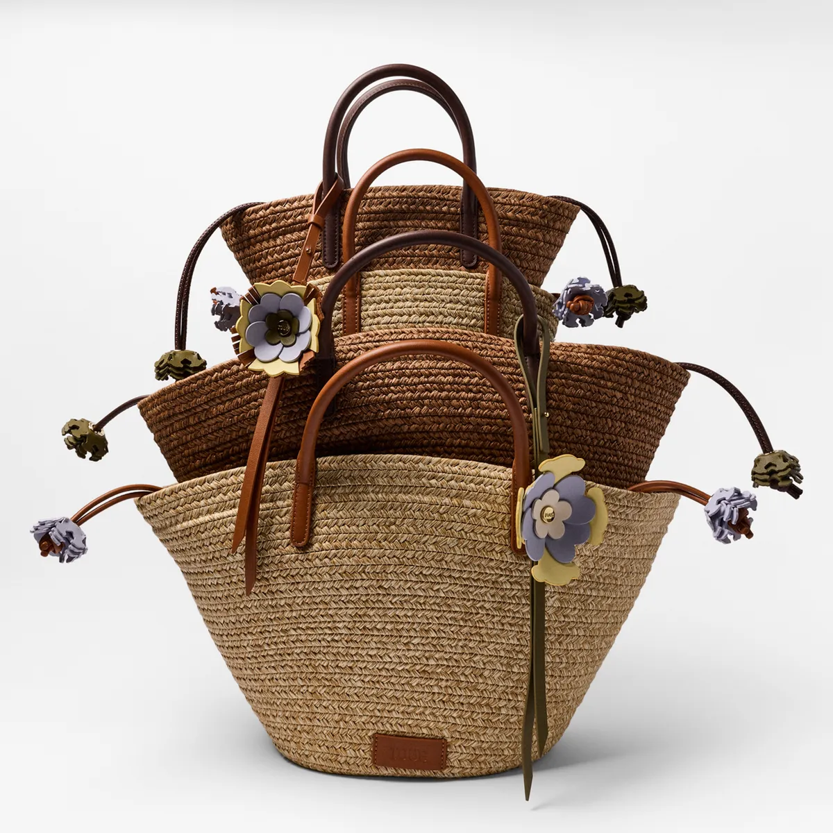 Raffia basket bags styled with floral leather charms · Fashion retouching, TimeLäB Studio Barcelona