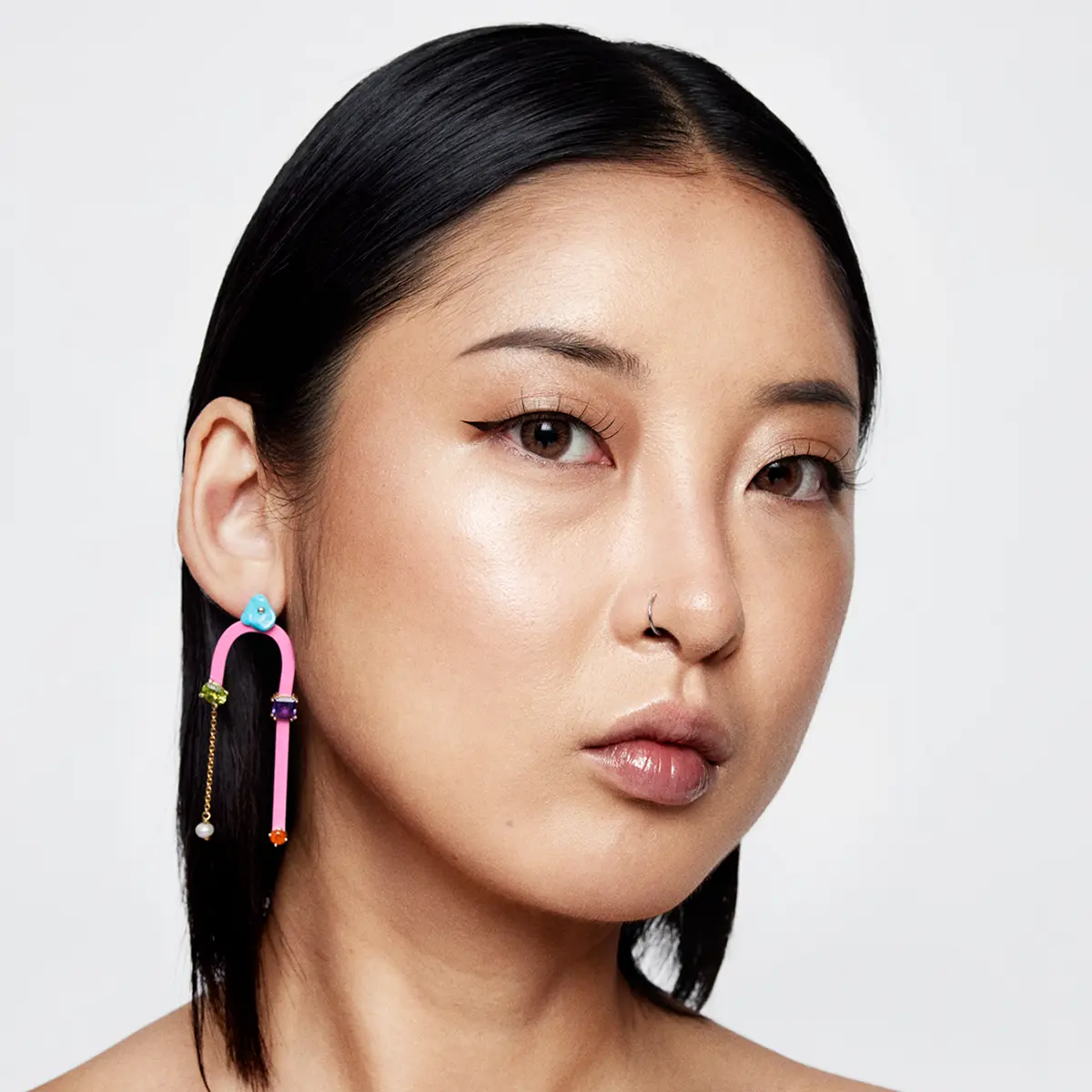 Model wearing bright statement earrings · Fashion retouching, TimeLäB Studio Barcelona