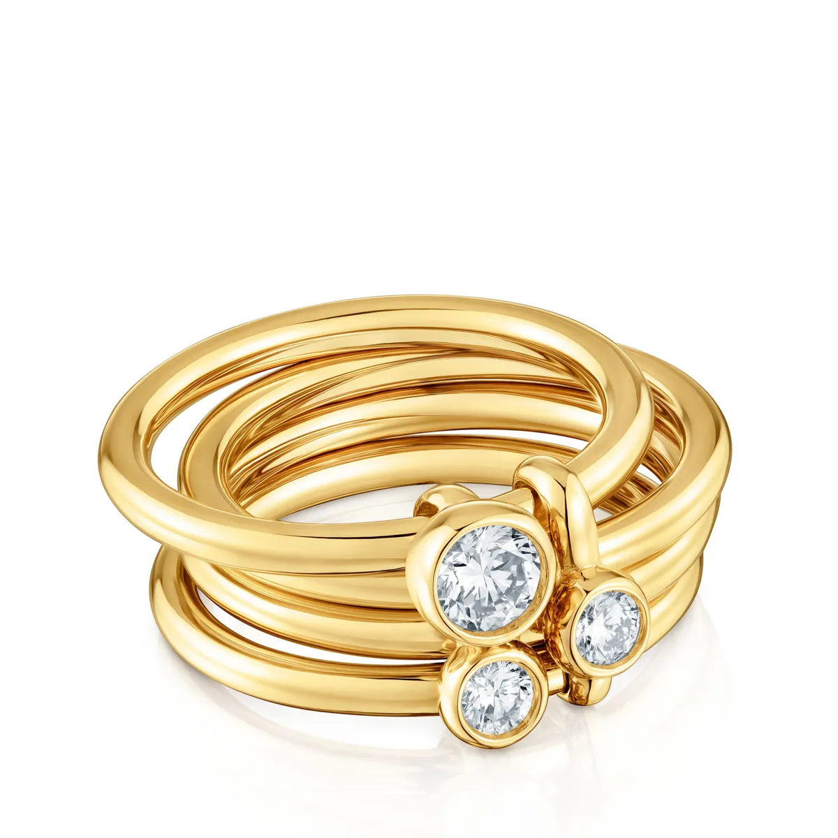 Stacked gold rings meeting at a solitaire diamond · Jewellery photography, TimeLäB Studio Barcelona