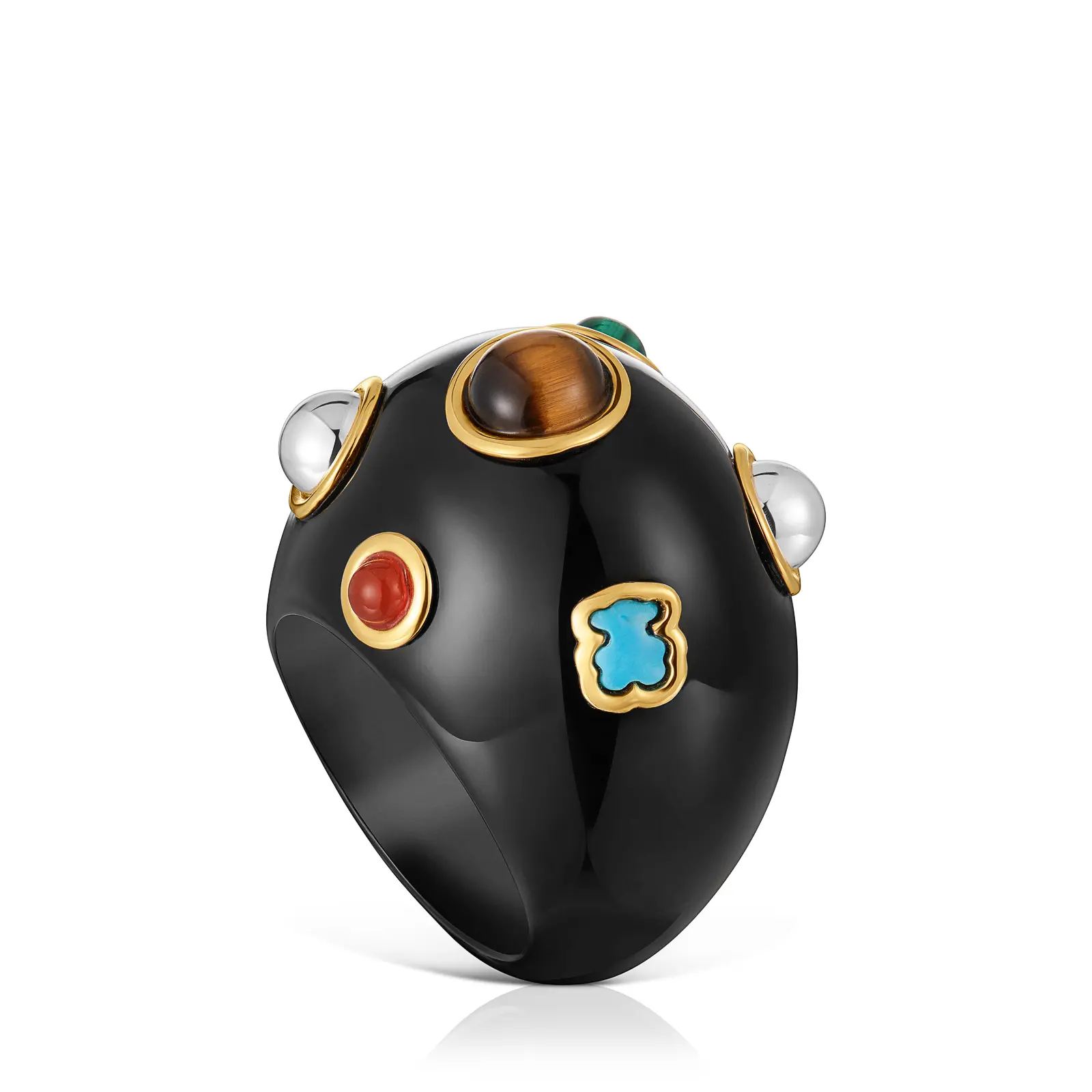 A black domed ring inlaid with coloured stones · Jewellery photography, TimeLäB Studio Barcelona