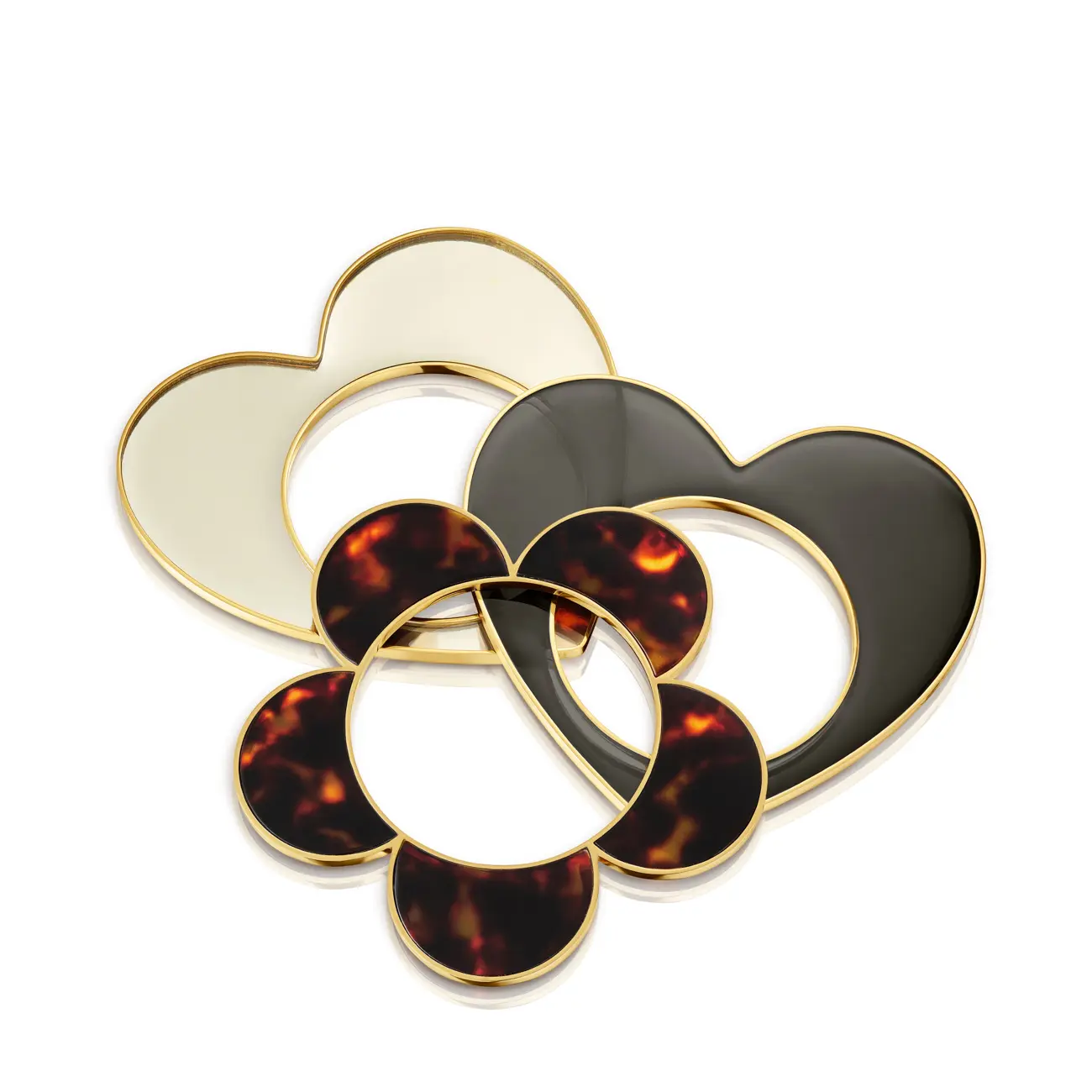 Overlapping hearts in tortoiseshell and cream · Jewellery photography, TimeLäB Studio Barcelona