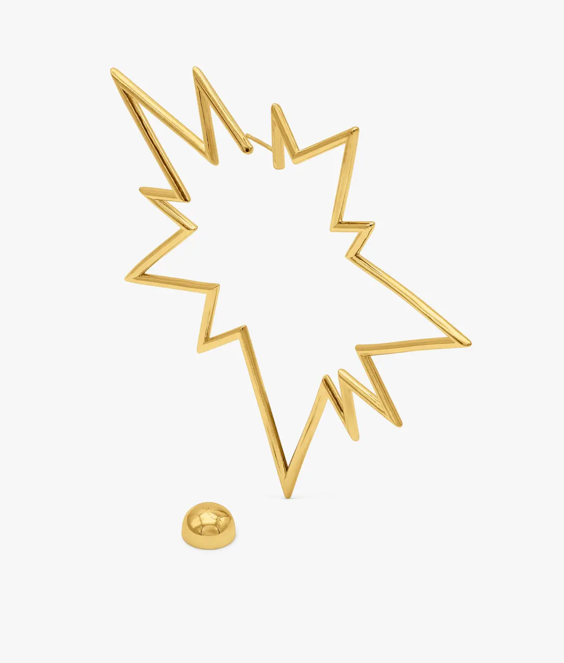 A gold starburst outline drawn in wire · Jewellery photography, TimeLäB Studio Barcelona