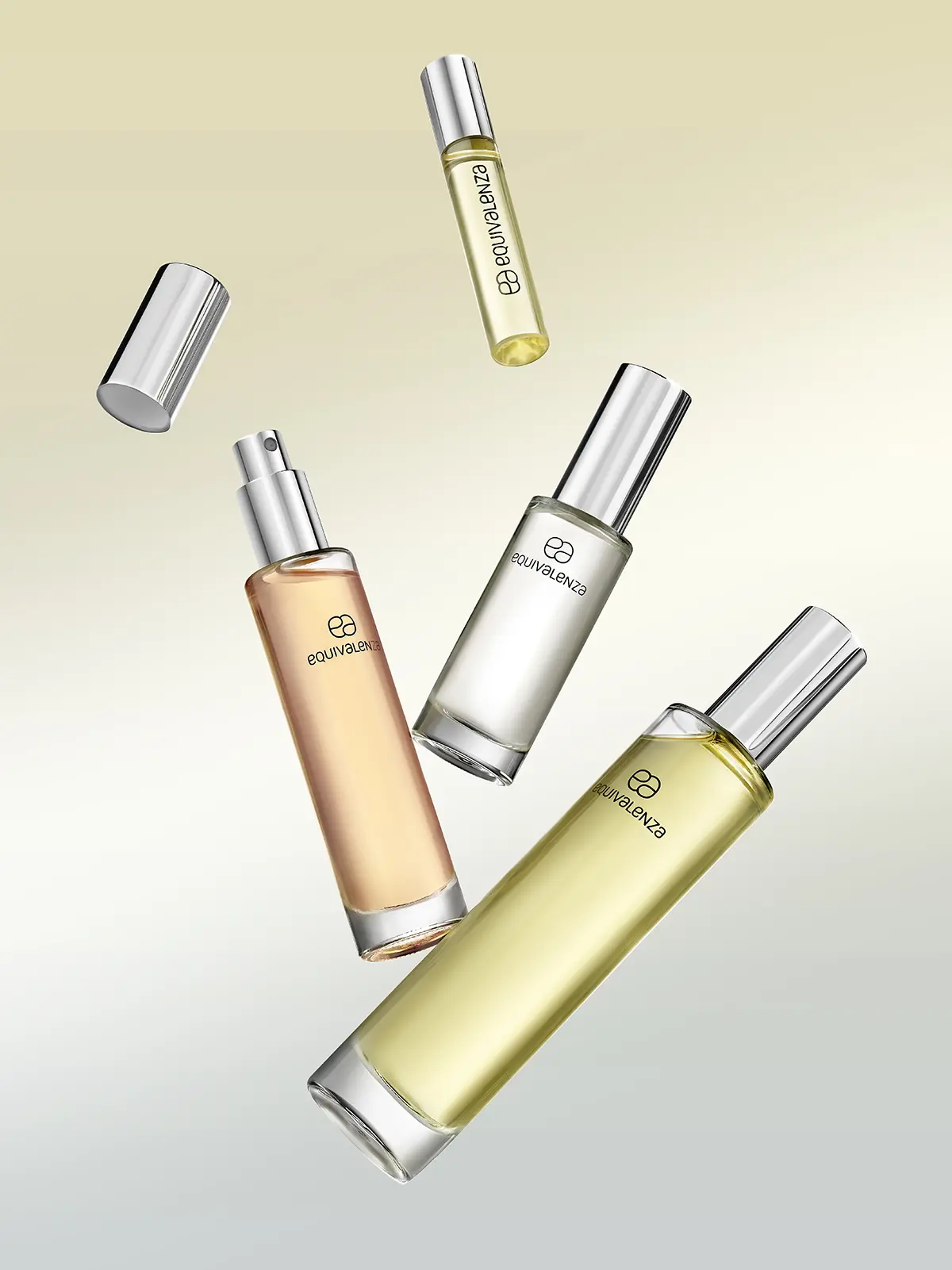 Three perfume vials suspended against a pale background · Product photography, TimeLäB Studio Barcelona
