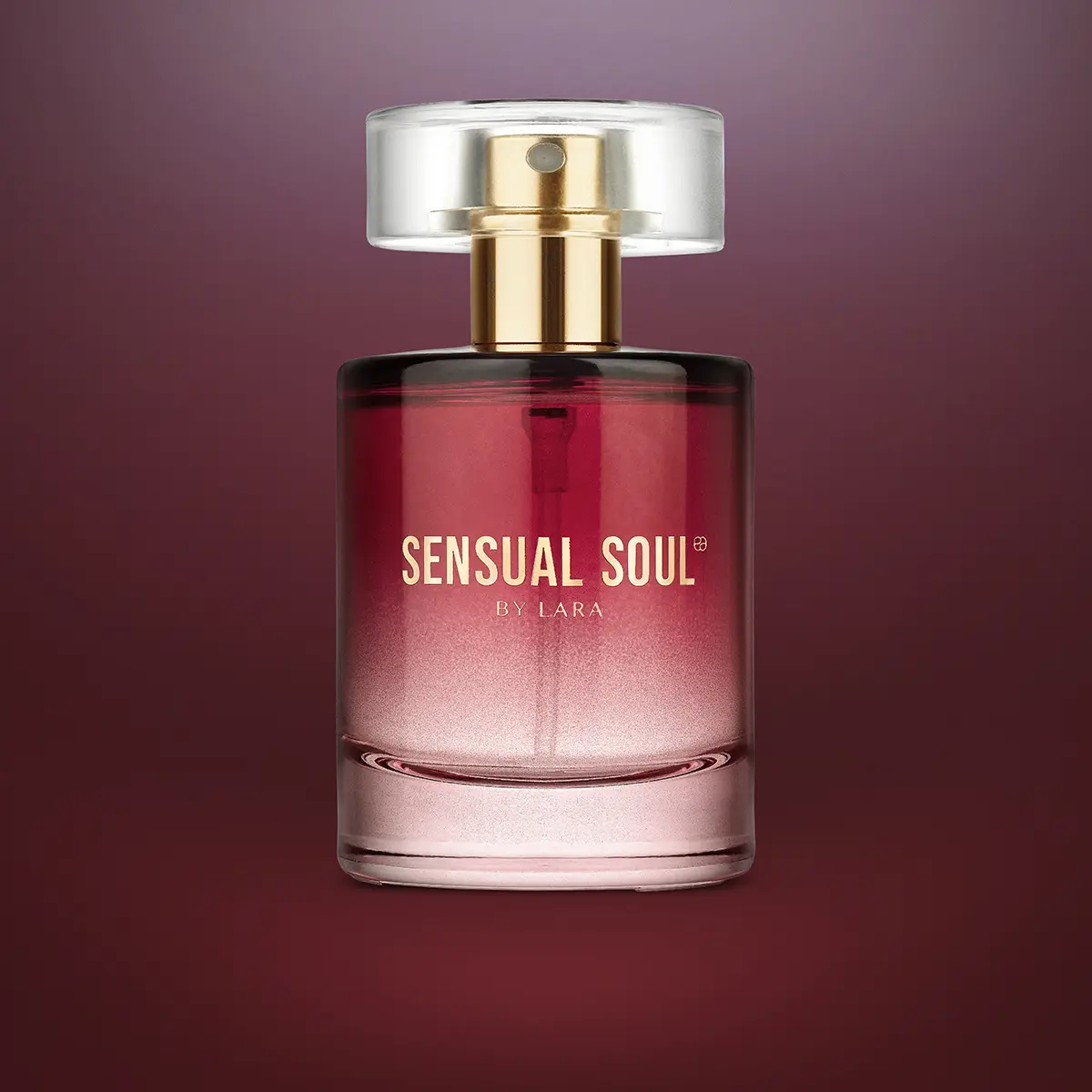 Sensual Soul perfume bottle on a deep burgundy gradient · Product photography, TimeLäB Studio Barcelona