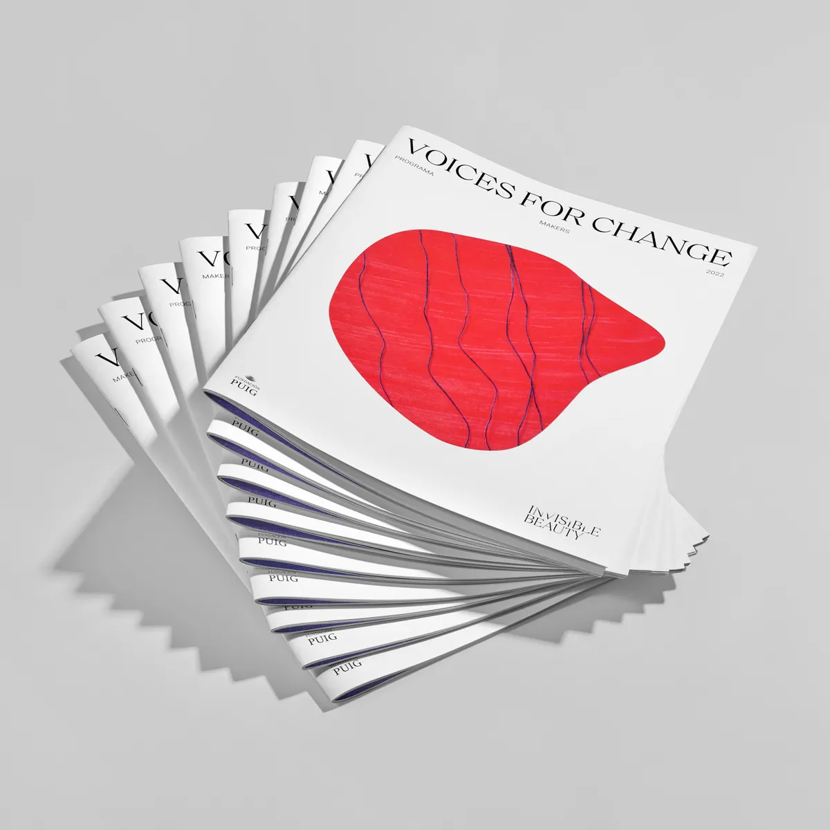 Printed “Voices for Change” cards fanned out · Product photography, TimeLäB Studio Barcelona