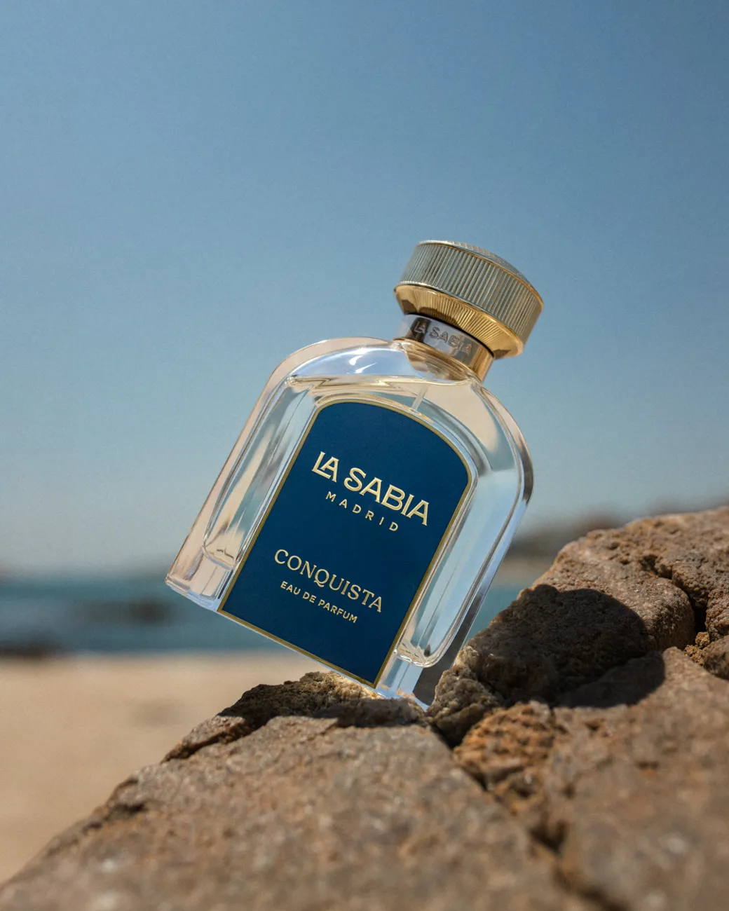 A fragrance staged on rocks by the sea · TimeLäB Studio