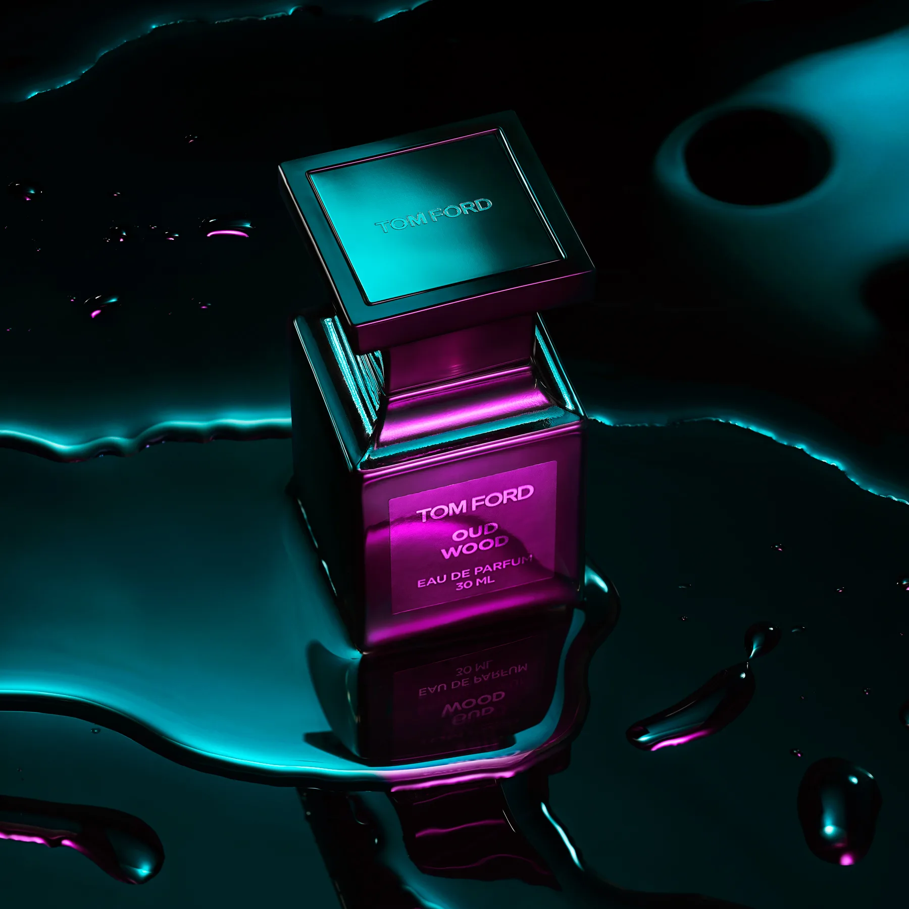 A premium fragrance bottle, immaculately retouched on reflective water — TimeLäB Studio, Barcelona